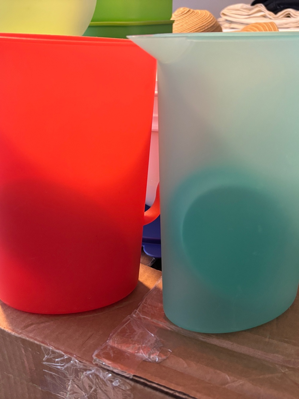 Tupperware Orange and Teal Plastic Pitcher Home Accents - $19each